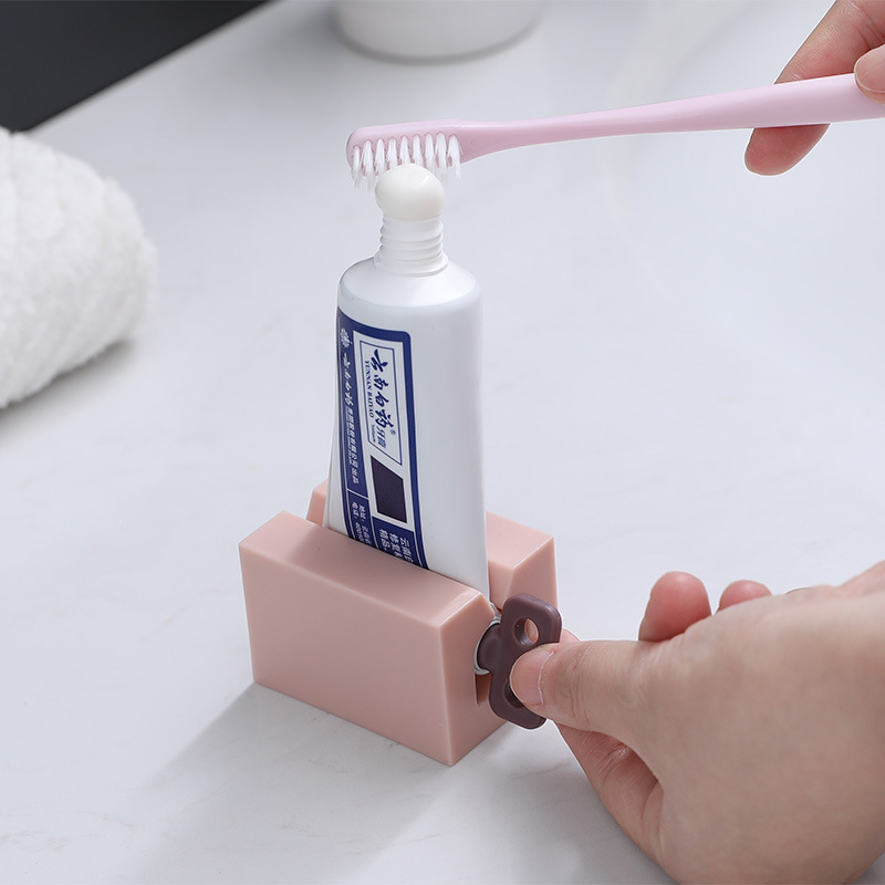 单个家用卫生间儿童创意手压式 洗面奶挤压器 手动懒人挤牙膏神器