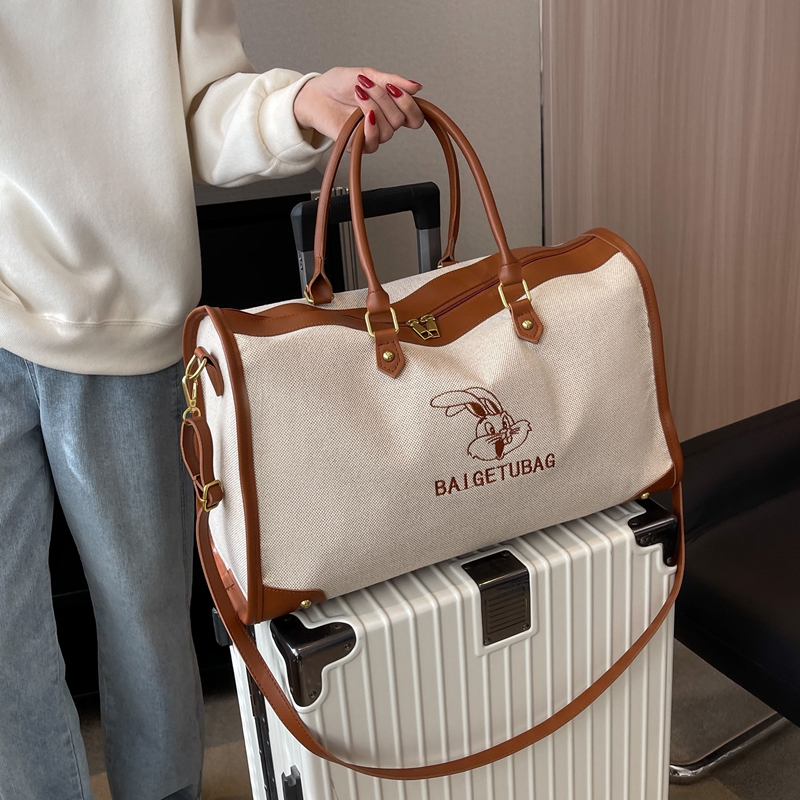 短途旅行包女帆布包收纳行李包手提包旅游出差轻便大容量行李包包
